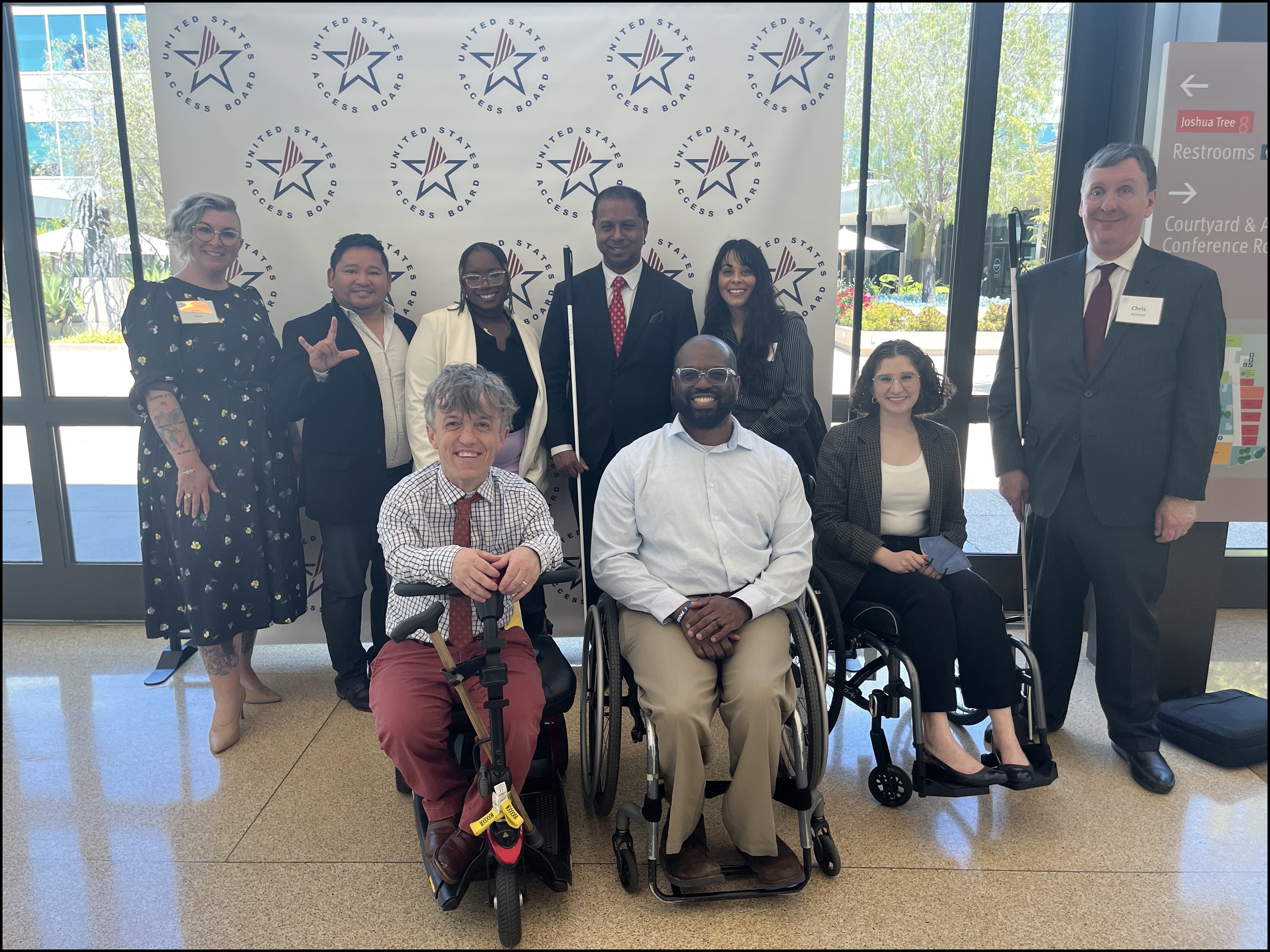 6 representatives from Disability Rights California pose next to Sachin Pavithran, General Counsel Chris Kuczynski, and Public Affairs Specialist Amy Nieves.